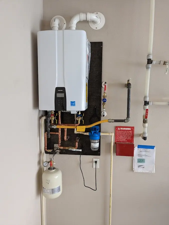 Professional plumber installing copper piping in a Rancho Palos Verdes home